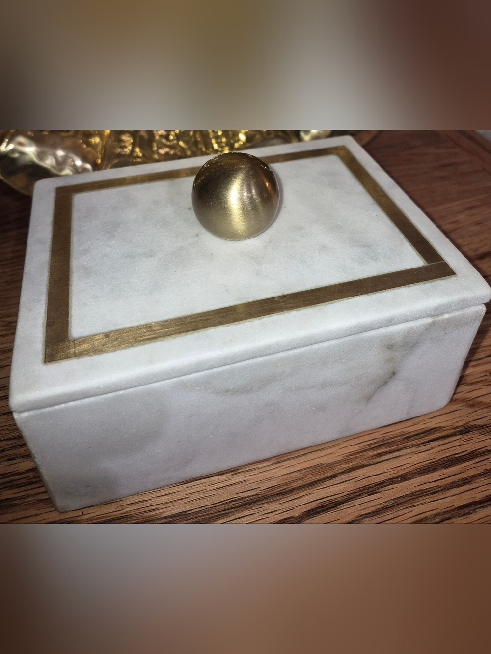 White Marble Trinket Box with Gold Accents and a ball-shaped handle 